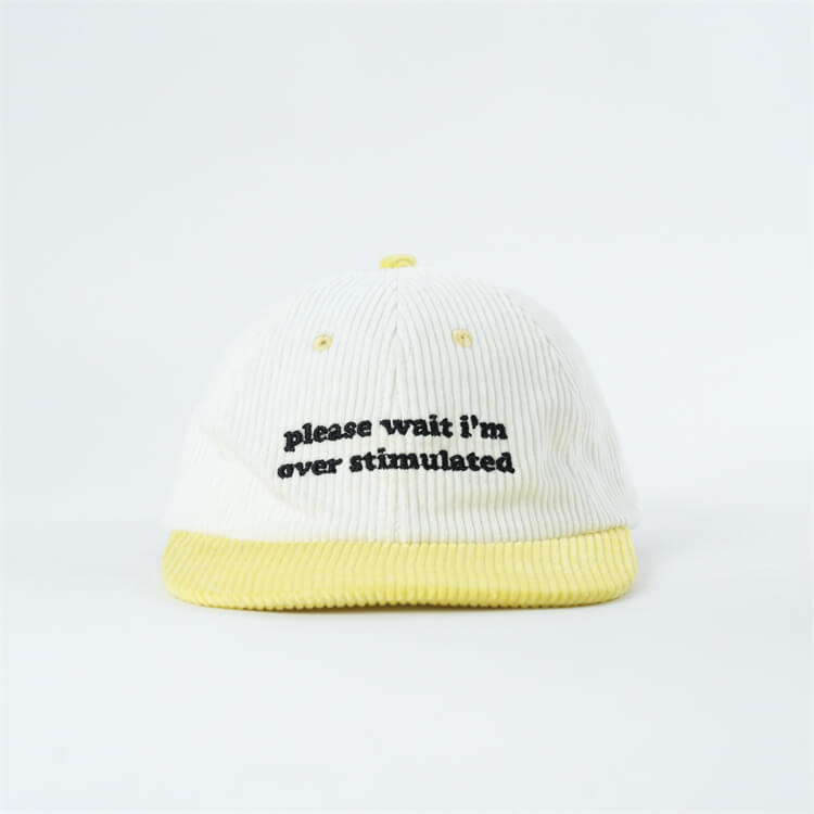 please-wait-im-overstimulated-yellow-cap
